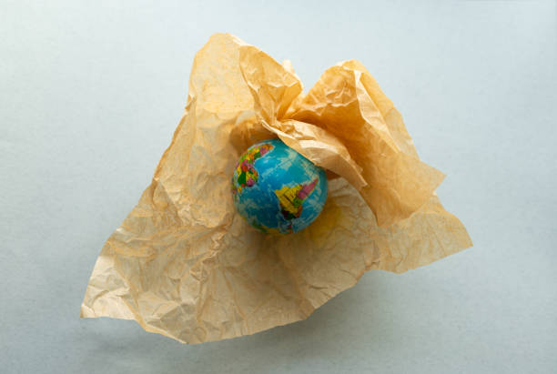 istock globe in a kraft bag, recycling concept 2079177835