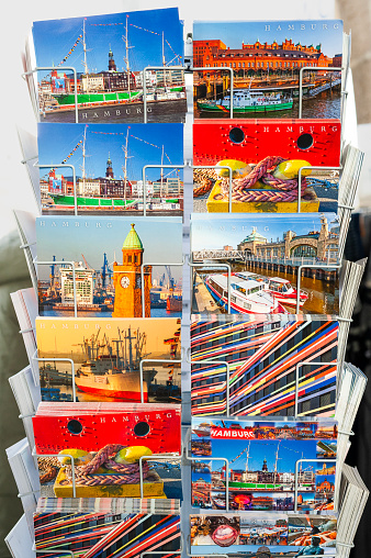 Hamburg, Germany - March 2024: Rack with colorful greeting cards from the port of Hamburg