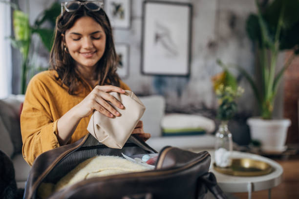 istock Young woman packing 2079255153