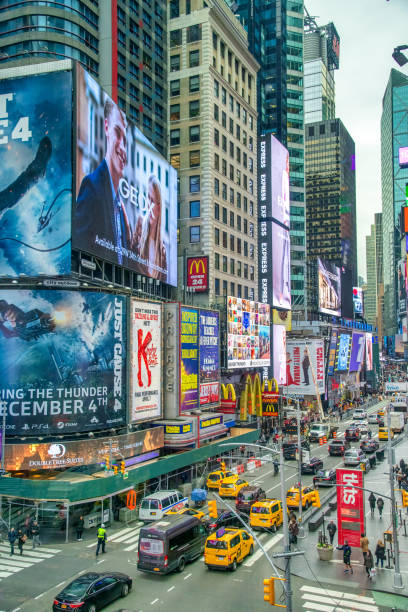 New York City - November 30, 2018: Tourists in Times Square in the morning
