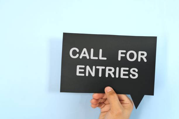 istock Human hand holding speech bubble with written phrase Call for Entries. Join contest invitation. 2079314099