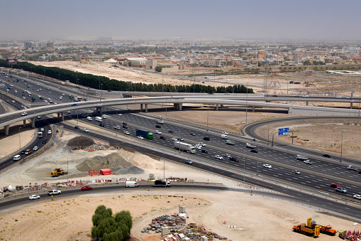 Dubai, UAE: intersection of Al Khawaneej Road / Airport Road (D89) with Sheikh Mohammed Bin Zayed Road (E311), east of Dubai International Airport.