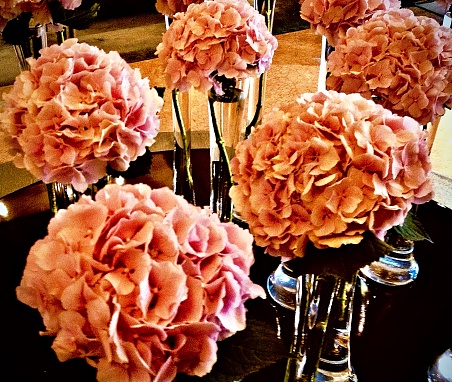 A display of pink roses in the hotel lobby