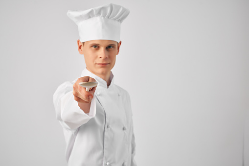 chef with kitchen utensils restaurant professional work cooking. High quality photo