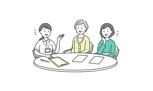 Illustration of a woman and a grandmother receiving explanations from a care manager