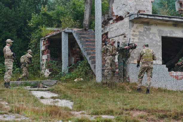 istock In a high stakes mission, a specialized military unit executes a tactical operation to secure a dangerous house where terrorists are believed to be hiding, showcasing precision and coordinated maneuvers 2079414425