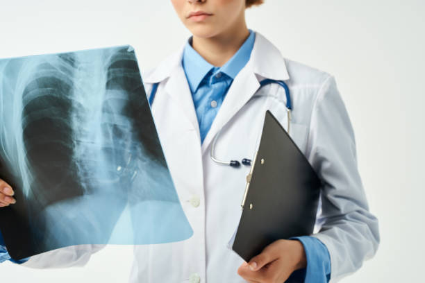 istock doctor in white coat x-ray close-up clinic 2079421156