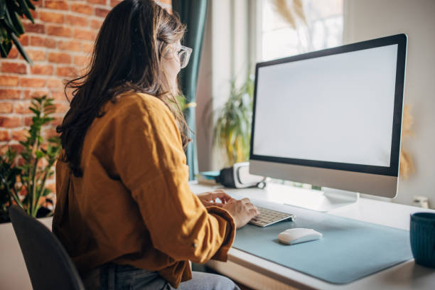 istock Young woman working in home office 2079429330