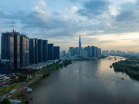 Aerial view of the Ho Chi Minh City skyline and skyscrapers in the central business center of Ho Chi Minh City. Panorama of cityscape on Saigon River in Ho Chi Minh City, Vietnam in the morning