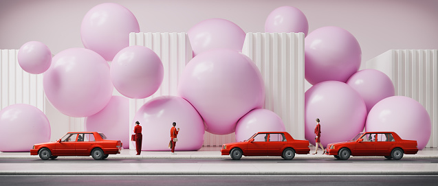 A surreal stage set of a street and soft pink spheres. All objects in the scene are 3D