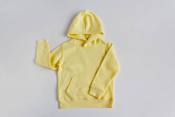 istock Yellow sweatshirt mockup on the white background. Template sweatshirt front for design and print. Hoodie with pocket, long sleeve.  Basic clothing witout logo. Top view 2079580328