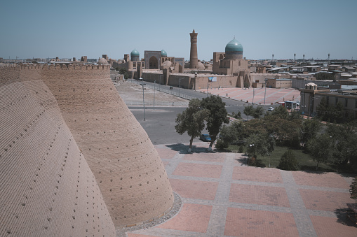 The Ark of Bukhara inside walls. The Ark Citadel is an ancient massive fortress located in Bukhara city, Uzbekistan. Blue sky with copy space for text