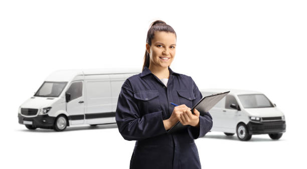 istock Female logistic worker with vans holding a clipboard 2079613352