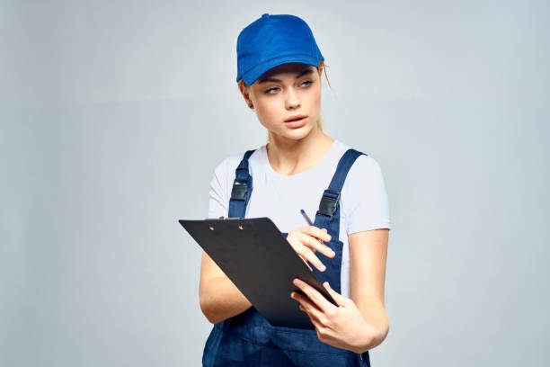 istock Woman courier in uniform documents service delivery 2079643141