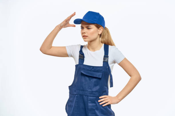 istock Working woman in blue cap uniform lifestyle emotions service light background 2079644686