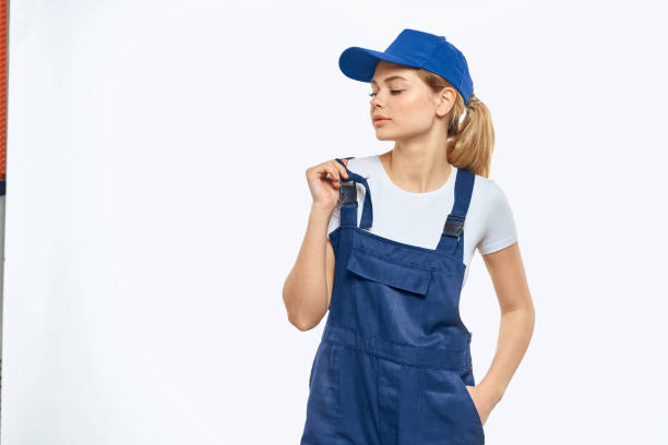istock Woman in working uniform blue cap delivery courier delivery service 2079649023