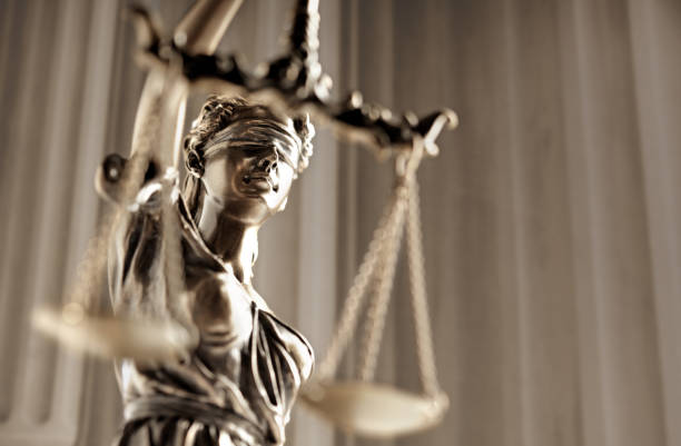 istock Lady Justice In Front Of Courthouse Columns 2079655957