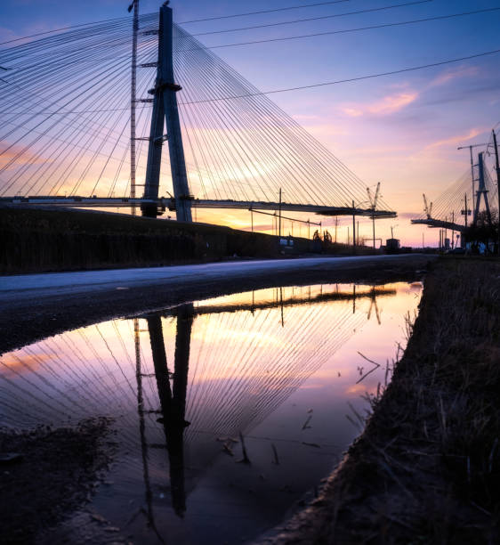 The Gordie Howe International Bridge, is expected to be fully constructed and open for business by 2024/2025.   The bridge will link Detroit, Michigan with Windsor, Ontario.