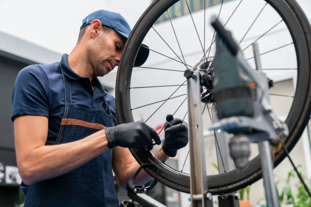 istock Mechanic installing the brakes on a bicycle 2079720861