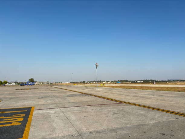 istock A large empty parking lot with a yellow line on the ground 2079734116