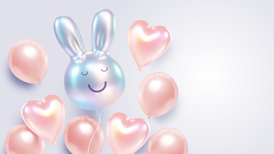 A whimsical display of glossy balloon bunnies in soft pastel hues of pink and blue, floating against a clear, serene sky, evoking the playful spirit of Easter