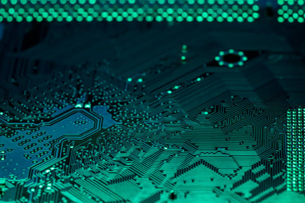 istock green computer motherboard. extreme closeup of electrical connections. 2079779911