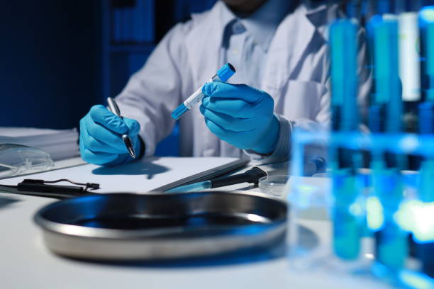 istock A researcher is taking notes. It is being developed in the lab as a profile for other researchers, A biological chemical scientist is writing a report on his day's work for a boss. 2079807967