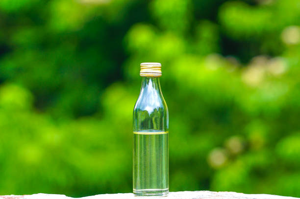 Oil bottle with oil, Glass oil bottle, Natural background,