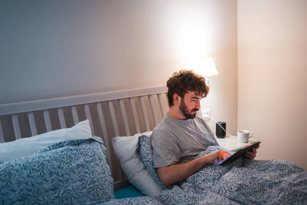 istock Caucasian Male Experiencing Insomnia in Bed at Night 2079908464