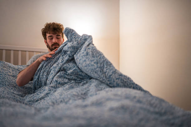 istock Caucasian Male with Insomnia in Bedroom Setting 2079908476