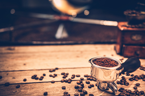 close up coffee beans in grinder