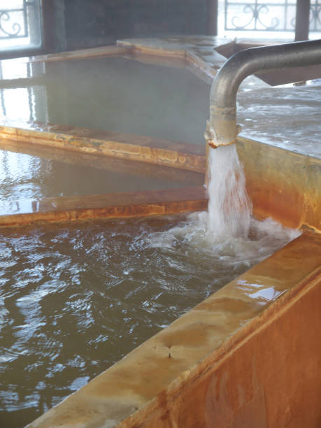 istock Japanese onsen hot spring bath with fountain 2079975042