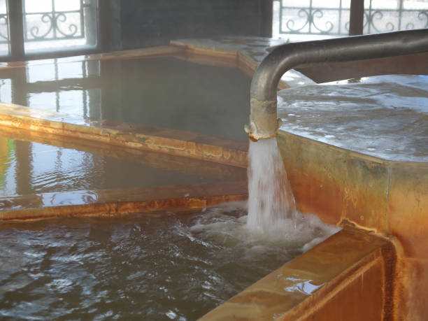 istock Japanese onsen hot spring bath with fountain 2079975552