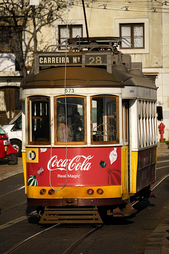 Tram 28 On a Sunny Afternoon Through the Historic Streets of Lisbon, Portugal. February 1, 2024.