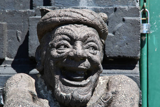 A Balinese statue in a garden