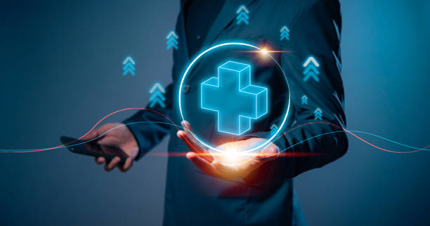 istock Businessman holding virtual blue plus sign to offer positive thing with thinking mindset or healthcare insurance symbol concept, like benefits, personal development, health insurance, growth concepts. 2080069364