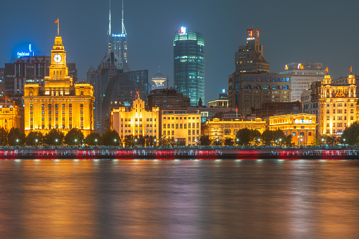 Shanghai, China - November 20th 2022: night view of shanghai bund historical landmark buildings along Huangpu river.