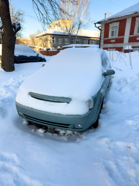 istock A car near the road covered with snow. Winter 2080186923
