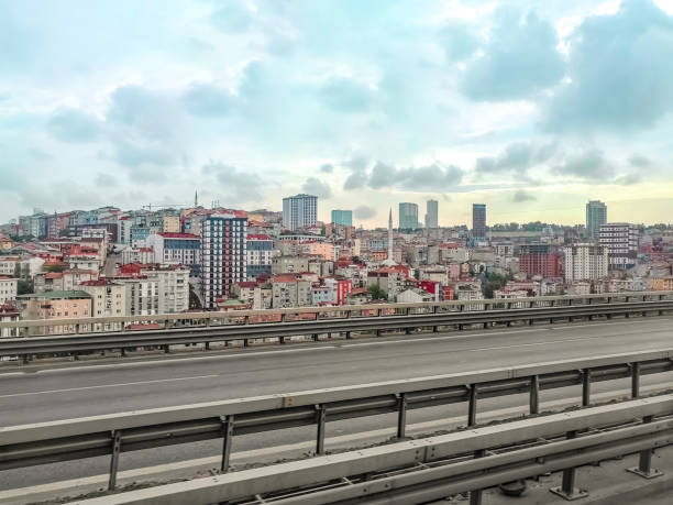 Suburb of Istanbul along an empty highway, Turkey. Colorful cityscape on a cloudy morning in a Turkish city