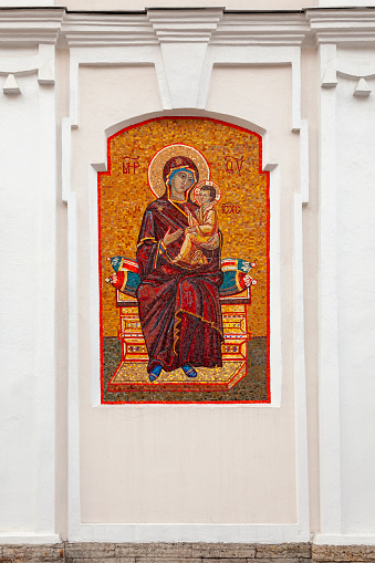 Mosaic icon of the Blessed Virgin Mary on the wall of an Orthodox church.