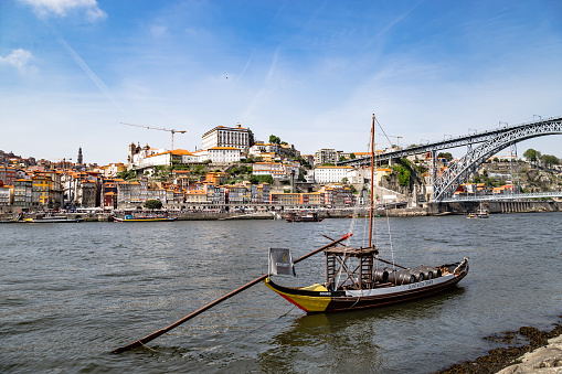 Lovely sunny day in Porto next to the Douro River iconic boat Portugal Europe