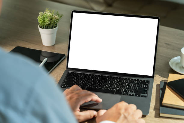 istock young man working Businessman using a desktop computer of the blank screen 2080312584