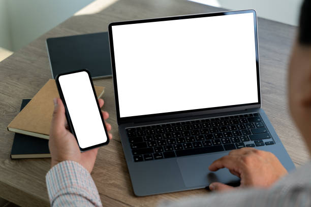 istock young man working Businessman using a desktop computer of the blank screen 2080313094