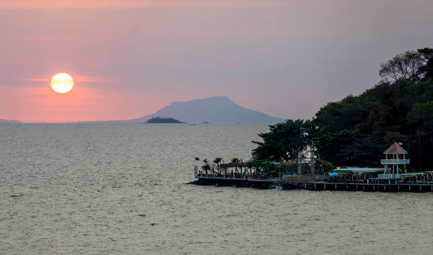 Kep sunset Kep, Kampot, Cambodia on Feb 20, 2024: sunset at Kep National Park kampot stock pictures, royalty-free photos & images