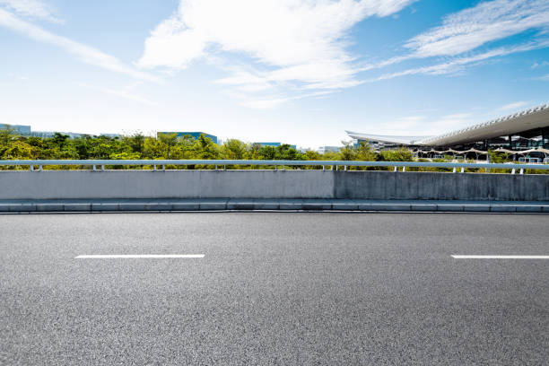 istock Empty asphalt road with buildings in the city 2080341506