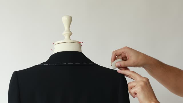 Tailor Working With Mannequin
