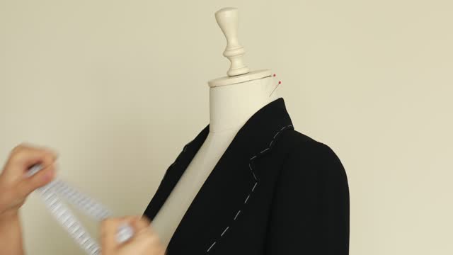 Tailor Working With Mannequin