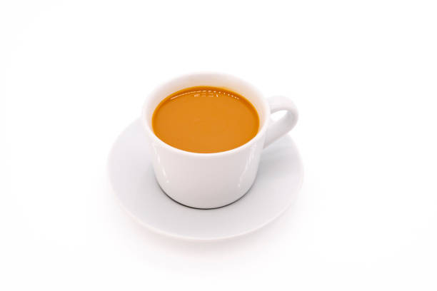 istock Creamy coffee on a white porcelain cup, isolated on white background with copy space. 2080459143