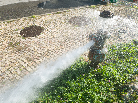 fire hydrant with water leak on public road, Lisbon.