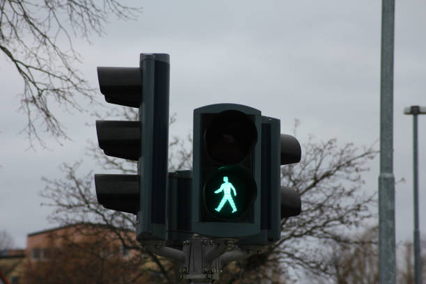 istock A traffic light with a green pedestrian figure - it means you can walk now 2080480367